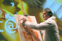 Heinrich Wagner beim Geschichtenerzhlen mit Pinsel, Schwamm und Farbe im Rahmen der art@work Prsentation